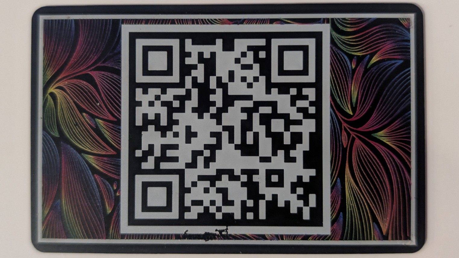 Back of NFC card with QR code and design